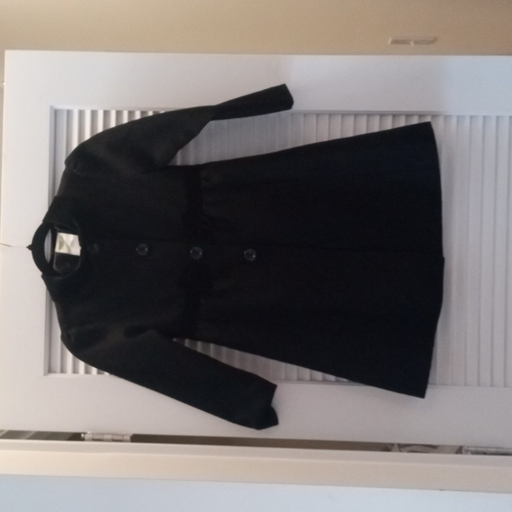Black button down front with black Velvet triming with bow in front